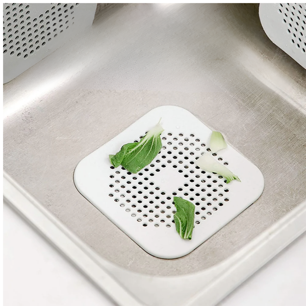 Sitǎ de scurgere din silicon, cu ventuze, pentru chiuvetǎ şi cadǎ